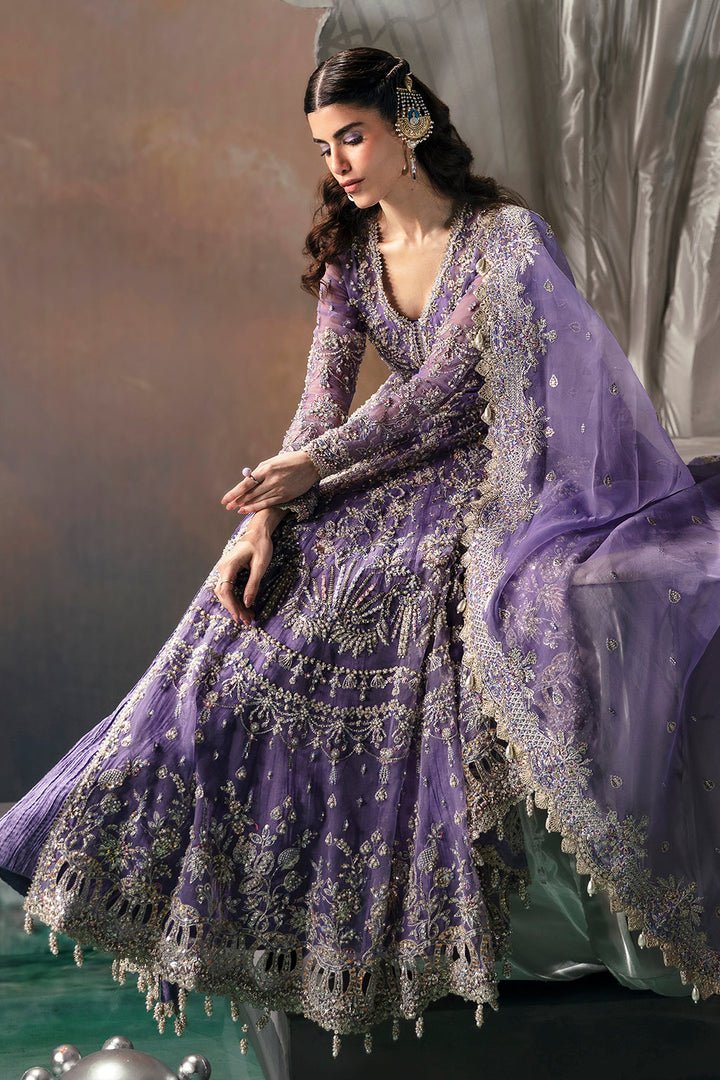 purple pakistani bridal dresses Purple Lehenga and Open Pishwas Pakistani Bridal Dress is a traditional masterpiece to wear on the big day. Hand-crafted details of gota, threads and floral designs make this stunning Mehndi Dress an